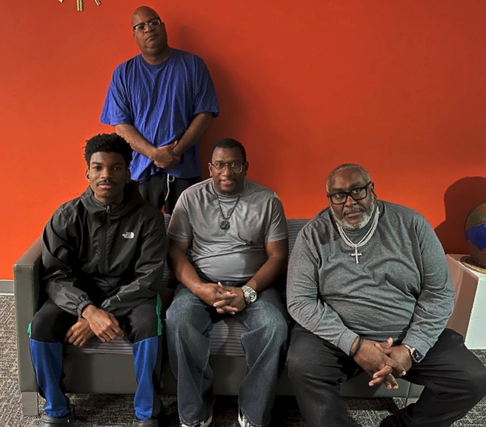 Standing: HDM. Sitting (L-R): Andrew Hall, John Johnson and Trakklaya